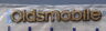 10416013 Oldsmobile Script Emblem Oem Nos New Rear Silhouette