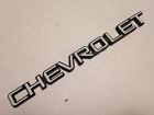 14103471 Chevrolet Oem Corsica Beretta Rear Bumper Nameplate Emblem
