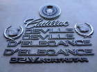 16044029 Cadillac Deville Delegance Decorative Decal Logo Emblem Ornaments Set Elegance