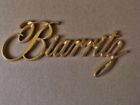 20301535 Cadillac Gold Biarritz Trunk Lid Emblem