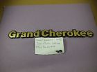 55295446 Jeep Grand Cherokee Fender Emblem Gold Nameplate Logo Badge Oem