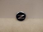 63890-cd10a Nissan 2003-2009 350z Emblem