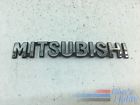 7415a479 Mitsubishi Rear Script Emblem