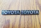 75351-39119 Toyota Pickup Truck Cab Pillar Emblem Badge Logo