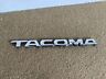 75427-04010-20 Toyota Tacoma Truck Chrome Emblem Geniune Oem