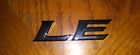 75443-06180 Toyota Accessories Le Emblem New Genuine Oem
