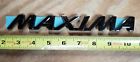 84894-2y906 Oem Nissan Maxima Black Emblem Decklid Trunk