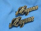 972807 Cadillac Delegance Emblems Black Sapphire And Gold Pair Nos
