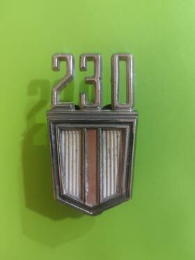 3864242 Chevrolet 230 Part # 1960s Emblem Name Badge Metal