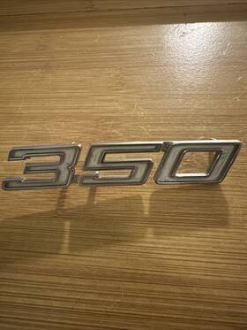 396323 Chevrolet 1970-1979 Chevy 350 Right Passenger Fender Nameplate Emblem Oem