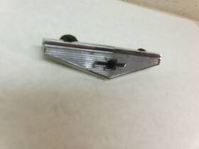 7663042 Chevrolet 1967 Nova Trunk Bowtie Triangle Ornament Orm