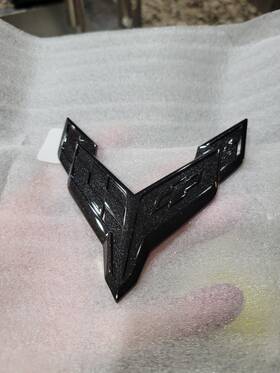 86563245 Chevrolet New C8 Corvette Carbon Flash Front Emblem Part #