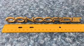 04630335 Chrysler 1990s Concorde Gold Plastic Rear Emblem Nameplate 33003 8-5/8 Inch
