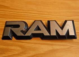 4260-259 Dodge 1981-1993 Inch Ram Fender Emblem - One Pin As Removed
