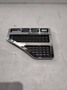2023024a Ford 2023024a/26a 2008-2010 F-250 Super Duty Left Fender Emblem Badge With Vents Chrome Oem