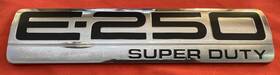 9c24-15402a17-bc Ford 2008-2014 E-250 Super Duty Van Rear Door Emblem Oem E250