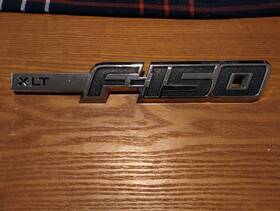 Bl34-16b115-aa Ford Bl34-16b115-ca 2009 - 2014 Xlt F-150 Lh Fender Emblem Used Oem Part #