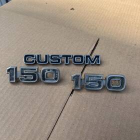 D5ub-11291000 Ford 1975 Truck 150 And Custom Emblems Used Good
