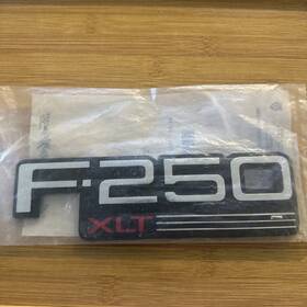 F2tz-16720-f Ford 1992 1995 1996 1997 F-250 Xlt Door Fender Nameplate Emblem Oem