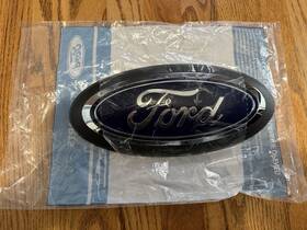 Mu5z-8213-a Ford New 2021-2023 F150 Front Black Oval Grille Emblem Without Camera Oem