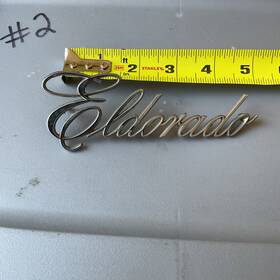 1498995 General Motors 1969-76 Cadillac Eldorado Script Emblem