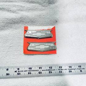 3725209 General Motors 1955-1956 Chevrolet Belair Rear Quarter Panel Crest Emblem Pair Oem Gm Ornament