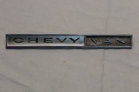 3848719 General Motors Original Used 1964 Chevy Van Side Emblem