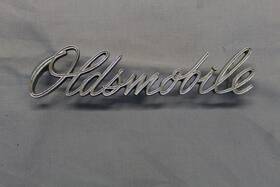 8728105 General Motors Original Vintage Oldsmobile Script Emblem