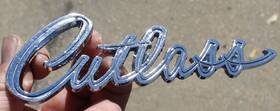 7791576 General Motors / Oldsmobile Oem 1968 Cutlass Trunk Script Emblem Name Plate