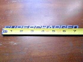 027026 Gm Supercharged Metal Emblem