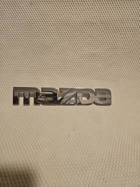 662a-51711 Mazda 2000 2002 Silver Trunk Lid Emblem Never Mounted W Pins
