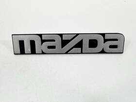 F17b-8b262-a Mazda 1991-1994 Navajo Front Emblem Oem Used