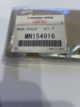Mn154916 Mitsubishi Genuine Factory Evo Trunk Emblem Mn154916. New-nos