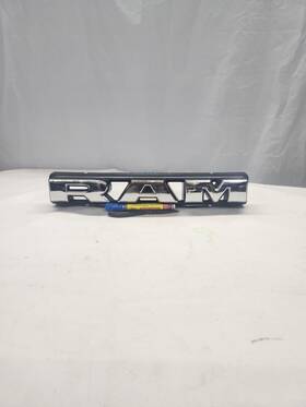 68293118ac Mopar #8766. 2019-2024 Ram 1500 Emblem Backing Plate 68293118a