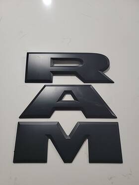 68358575aa Mopar 2019-2024 Ram 2500 3500 Black Tailgate Emblem Nameplate