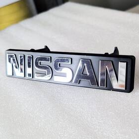 62390-15e00 Nissan Nos Oem Maxima Grille Emblem 1985 1986 Front