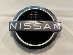 62890-9bu1a Nissan Frontier Oem 2022-2024 Front Grille Emblem - White Accent