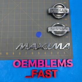 62892-2y900 Nissan 2000 2001 Maxima Oem Factory Chrome Front Grille Rear Trunk Emblem Set