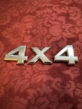 93495-ez15a Nissan 2005-2015 Titan Frontier Xterra Inch 4x4 Emblem - Chrome Oem