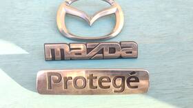Bjoe-51-720 Oem 1999- 2003 Mazda Protege And Logo Trunk Emblem Name 3 Pieces