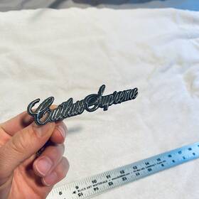 1650896 Oldsmobile Oem Cutlass Supreme 4.25 Inch Script Emblem Badge Logo Nameplate