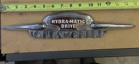 447r7r7r Oldsmobile 1946-1949 Olsmobile Hydromatic Drive Trunk Emblem