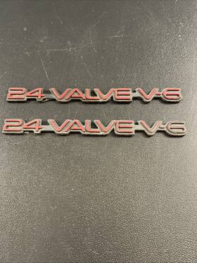 10231023 Pontiac Grand Prix 24 Valve V-6 Front Fender Name Emblem Red