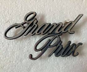 L-7000 Pontiac 498675 Original Vintage Grand Prix Script Emblem #498675 1970-1979