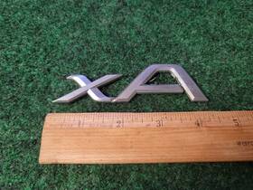 712753-0000 Scion 2004-2006 Xa Emblem Logo Badge Symbol Rear Tailgate Trunk Silver Gray 2s9