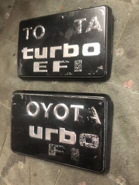 75351-89123 Toyota 1984-1988 Pickup Truck Turbo Efi B-pillar Badge Emblem 3 Inch Long Oem