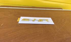 75442f4011 Toyota 2017-2018 C-hr Rear Hatch Emblem New Oem