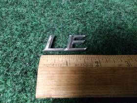 75443-aa100 Toyota Genuine Camry Inch Le Emblem Used 2002-2006 Rear 5s4