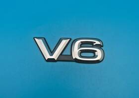 7544389101 Toyota 1990-1995 4runner Rear Liftgate V6 Emblem Badge 2.625ftft Oem