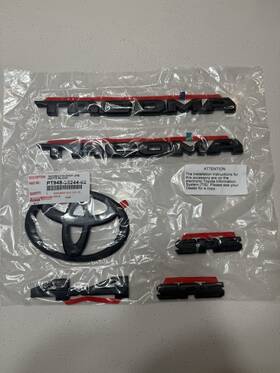 Pt948-35244-02 Toyota 2024-2025 Tacoma Sr5 Blackout Emblem Overlay Kit